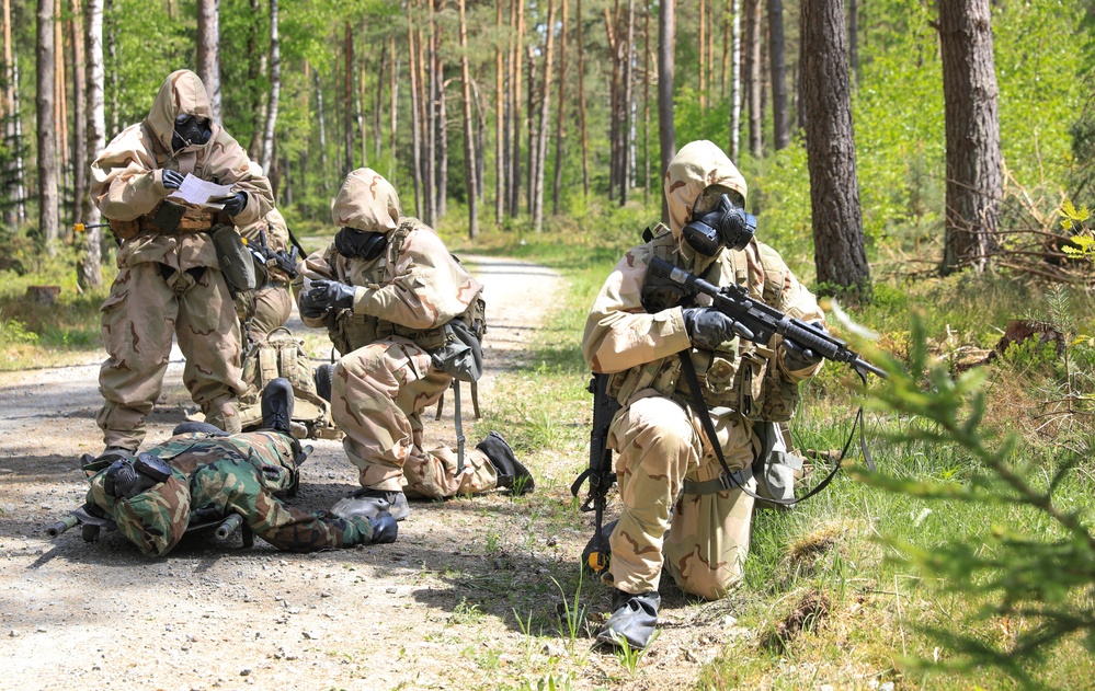 Competitors participate in CBRN Lane during V Corps Best Squad Competition