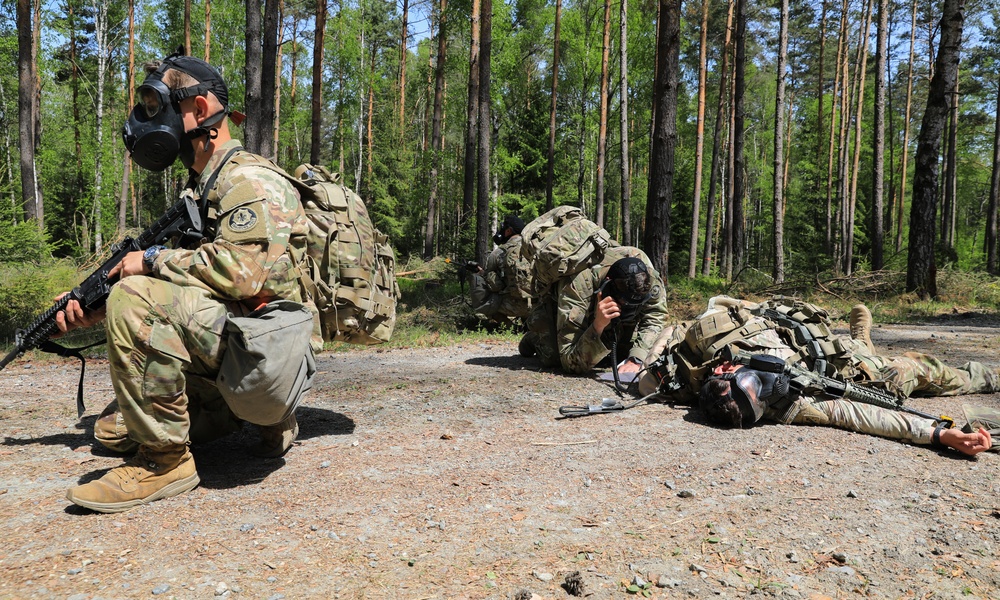Competitors participate in CBRN Lane during V Corps Best Squad Competition