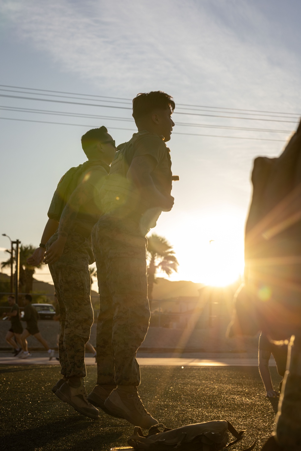 The Combat Center COMMSTRAT conducts PT in honor of LCpl Hug and Cpl Medina