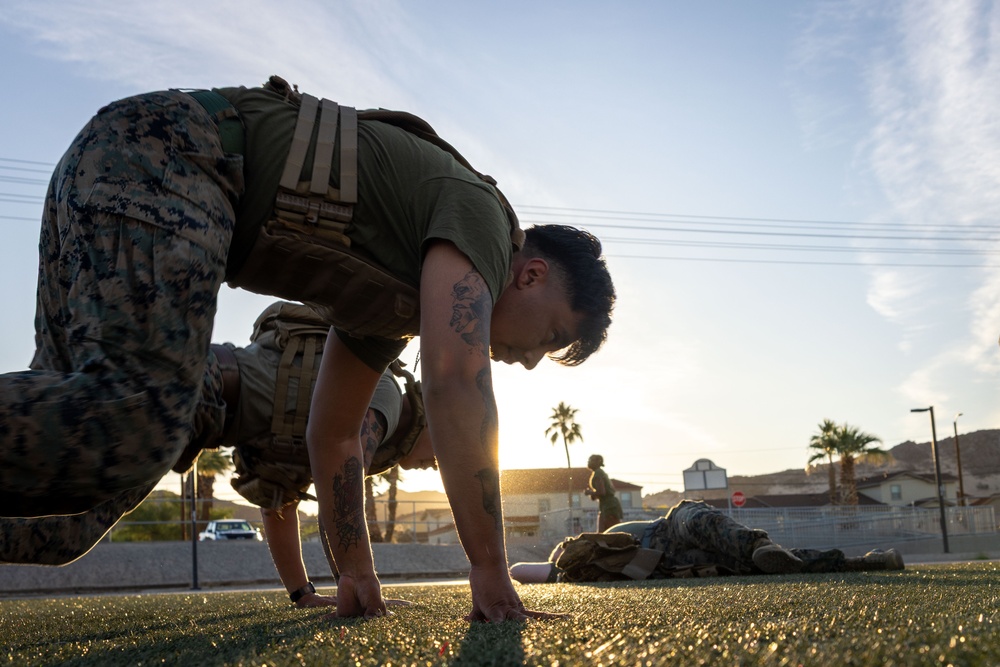 The Combat Center COMMSTRAT conducts PT in honor of LCpl Hug and Cpl Medina