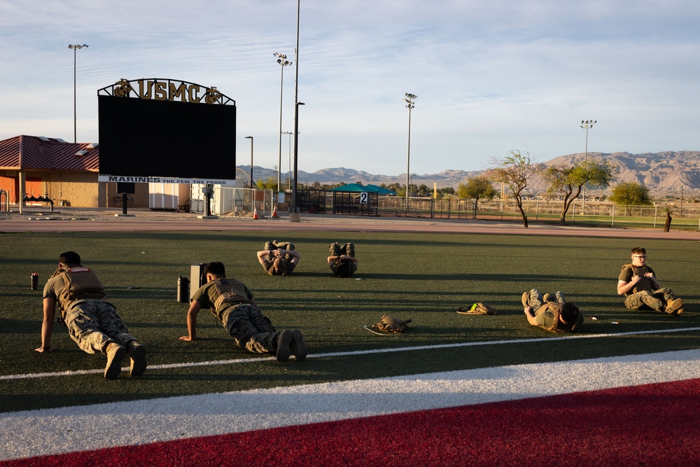 The Combat Center COMMSTRAT conducts PT in honor of LCpl Hug and Cpl Medina