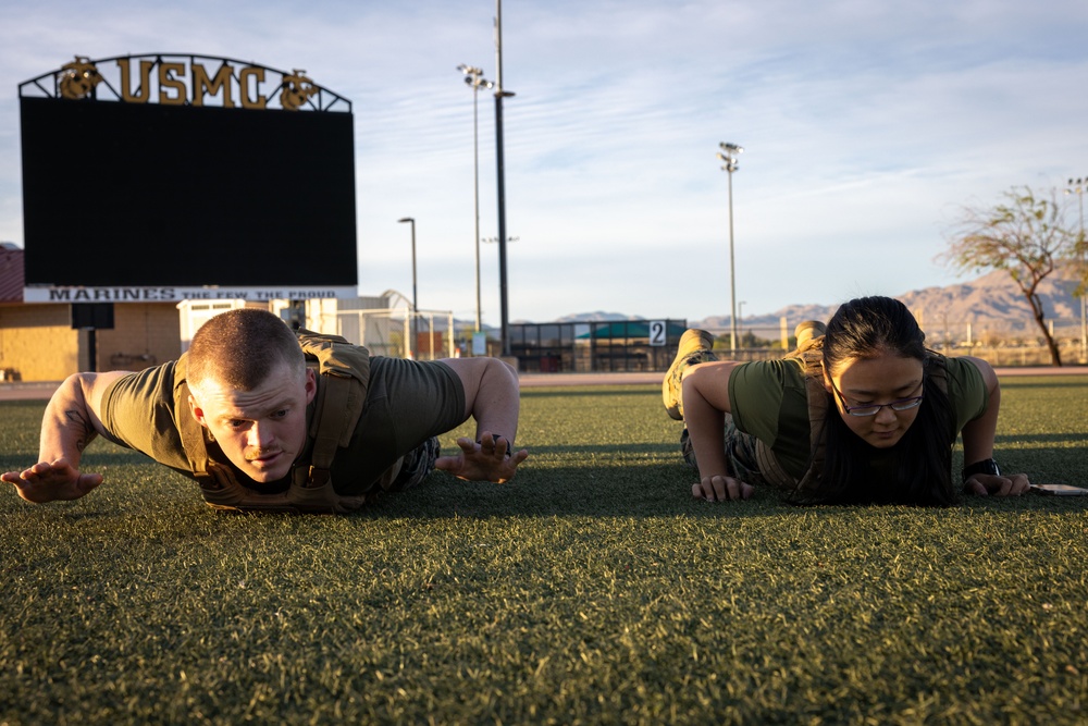 The Combat Center COMMSTRAT conducts PT in honor of LCpl Hug and Cpl Medina