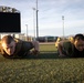 The Combat Center COMMSTRAT conducts PT in honor of LCpl Hug and Cpl Medina