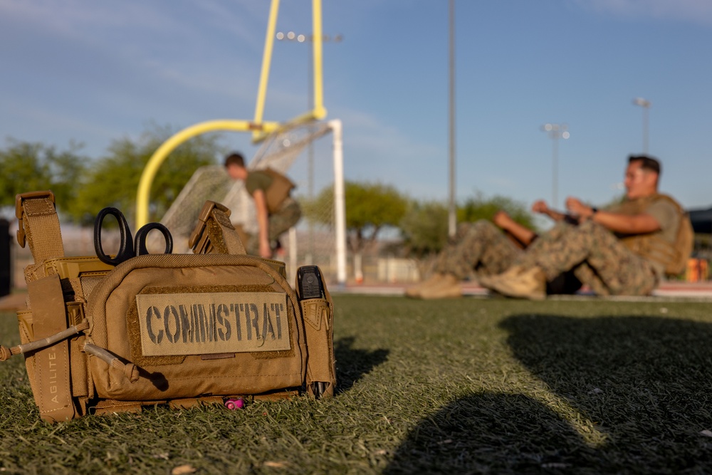 The Combat Center COMMSTRAT conducts PT in honor of LCpl Hug and Cpl Medina