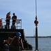 Coast Guard Cutter Frank Drew services buoys in Portsmouth, Virginia