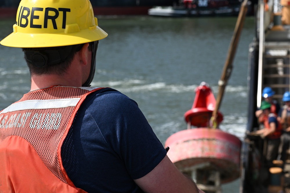 Coast Guard Cutter Frank Drew services buoys in Portsmouth, Virginia