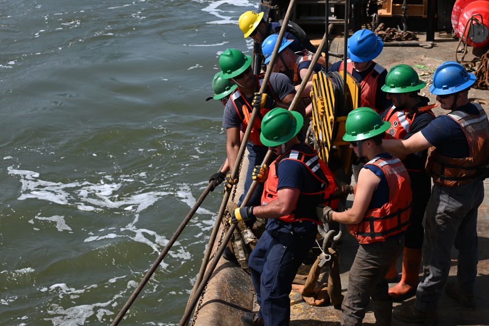 Coast Guard Cutter Frank Drew services buoys in Portsmouth, Virginia
