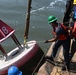 Coast Guard Cutter Frank Drew services buoys in Portsmouth, Virginia