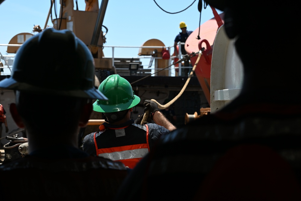 Coast Guard Cutter Frank Drew services buoys in Portsmouth, Virginia
