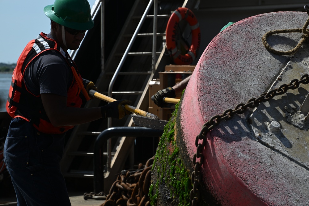 Coast Guard Cutter Frank Drew services buoys in Portsmouth, Virginia