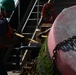 Coast Guard Cutter Frank Drew services buoys in Portsmouth, Virginia