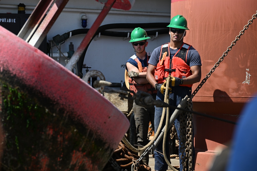 Coast Guard Cutter Frank Drew services buoys in Portsmouth, Virginia