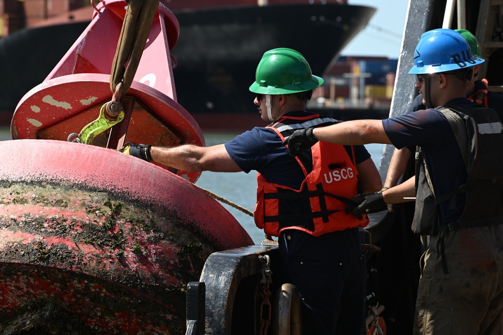 Coast Guard Cutter Frank Drew services buoys in Portsmouth, Virginia