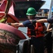 Coast Guard Cutter Frank Drew services buoys in Portsmouth, Virginia