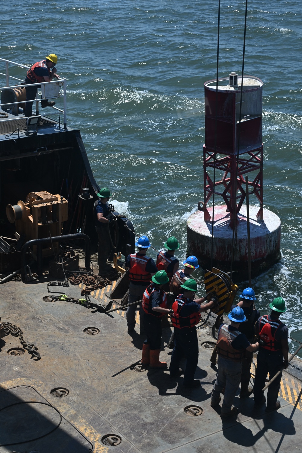 Coast Guard Cutter Frank Drew services buoys in Portsmouth, Virginia