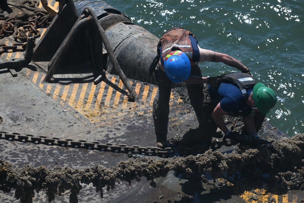 Coast Guard Cutter Frank Drew services buoys in Portsmouth, Virginia