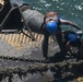Coast Guard Cutter Frank Drew services buoys in Portsmouth, Virginia