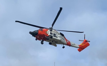 USCG aircrews rescue 4 from water tower
