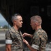 Maj Donaldson receives Meritorious Service Medal from Major General Wortman