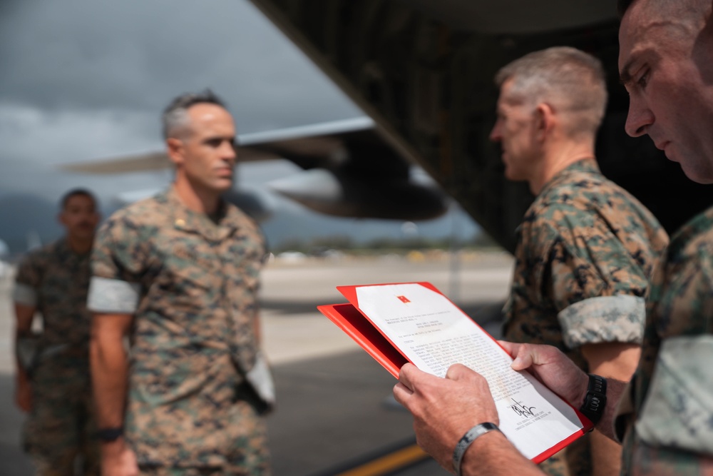 Maj Donaldson receives Meritorious Service Medal from Major General Wortman