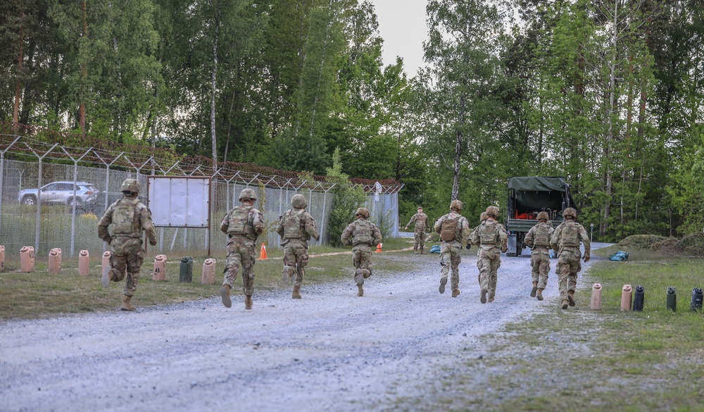 Competitors conduct Expert Physical Fitness Assessment during V Corps Best Squad competition