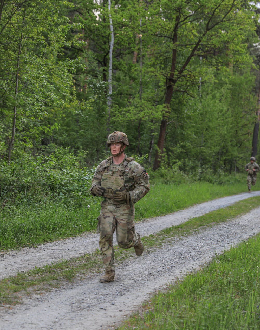 Competitors conduct Expert Physical Fitness Assessment during V Corps Best Squad competition