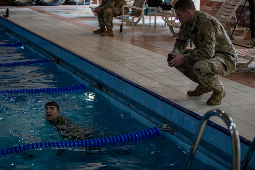 U.S. Army Soldiers earn through physical challenge, the German Armed Proficiency Badge.
