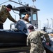 Sailors handle remotely operated vehicle.