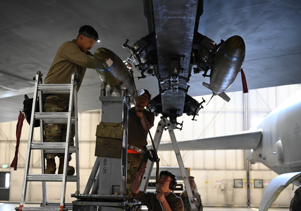 Airmen from the 69th Bomber Generation Squadron compete in a Quarterly Load competition
