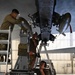 Airmen from the 69th Bomber Generation Squadron compete in a Quarterly Load competition