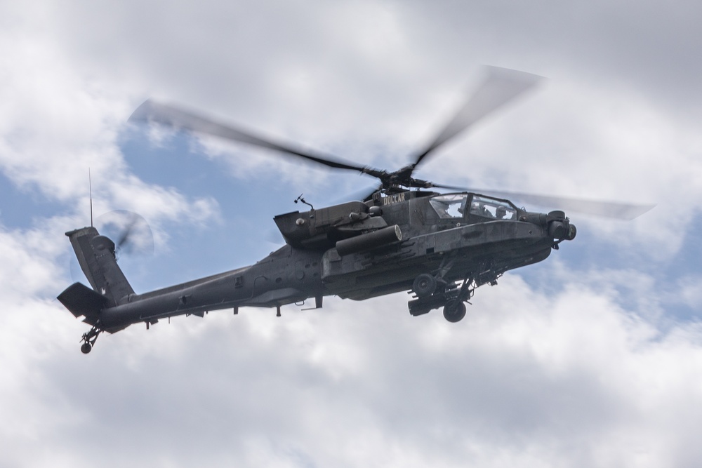 1st Armored Division Apache Pilots Conduct SERE Training at JMRC