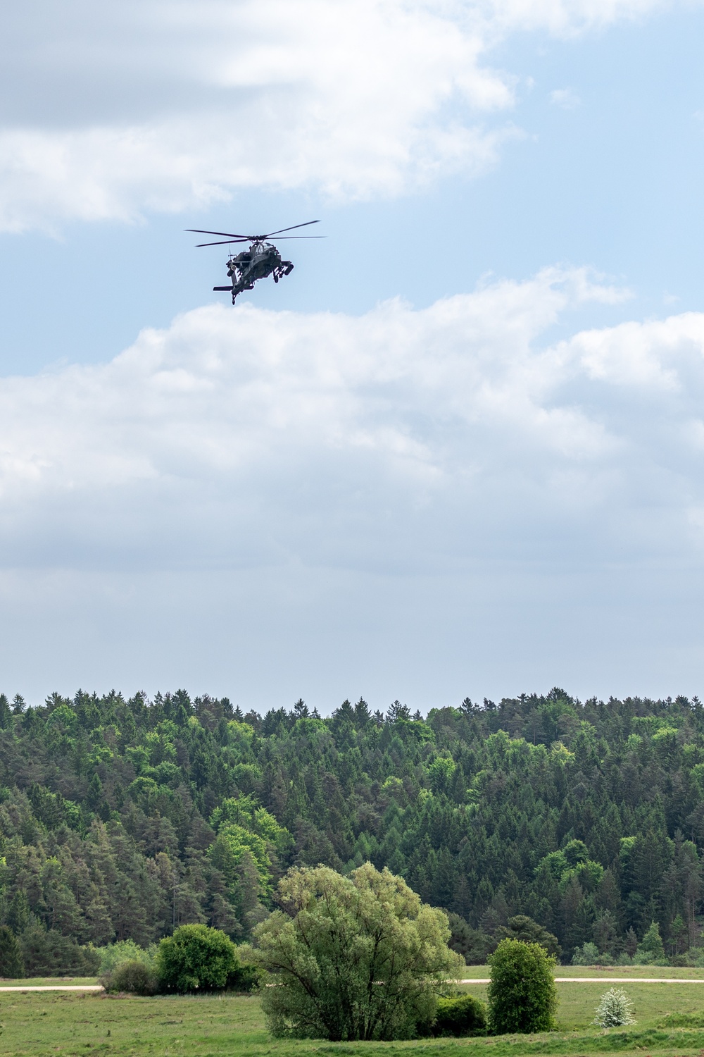 1st Armored Division Apache Pilots Conduct SERE Training at JMRC