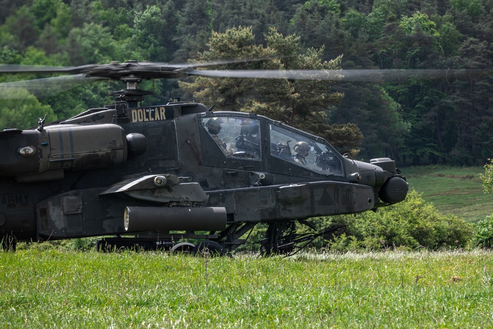 1st Armored Division Apache Pilots Conduct SERE Training at JMRC