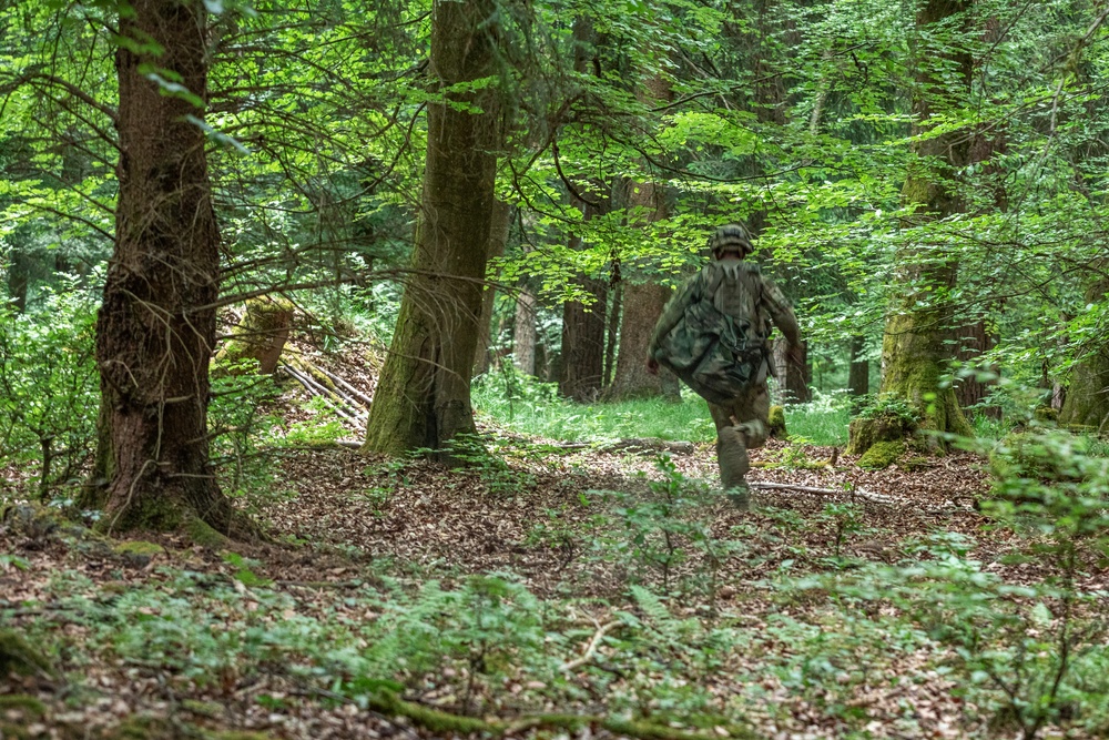 1st Armored Division Apache Pilots Conduct SERE Training at JMRC