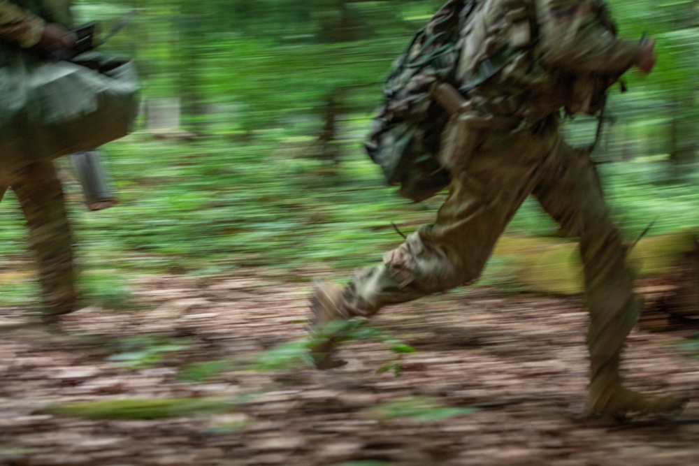 1st Armored Division Apache Pilots Conduct SERE Training at JMRC