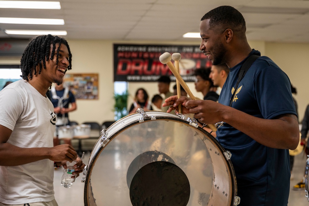 Stick Masters teach Sailors to play percussion instruments