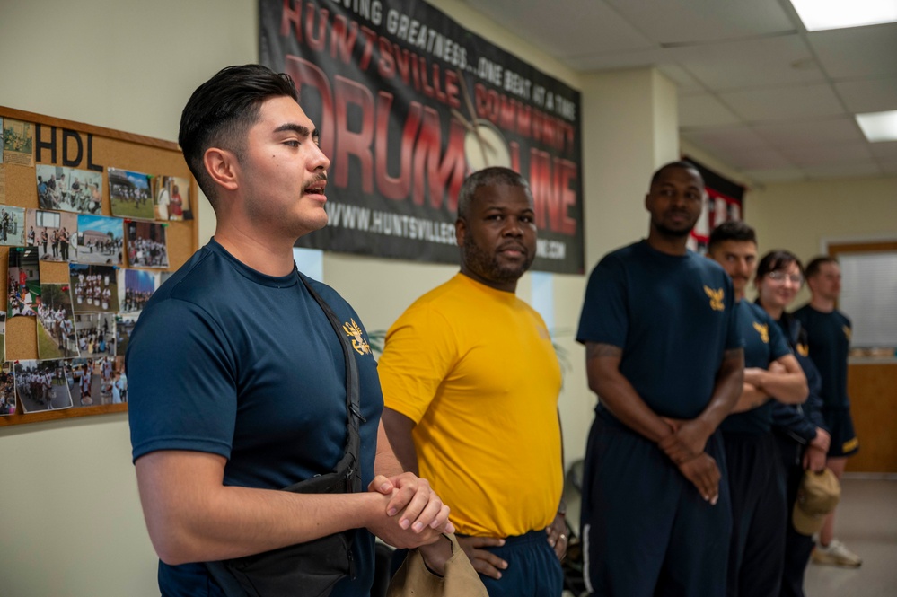 Stick Masters teach Sailors to play percussion instruments