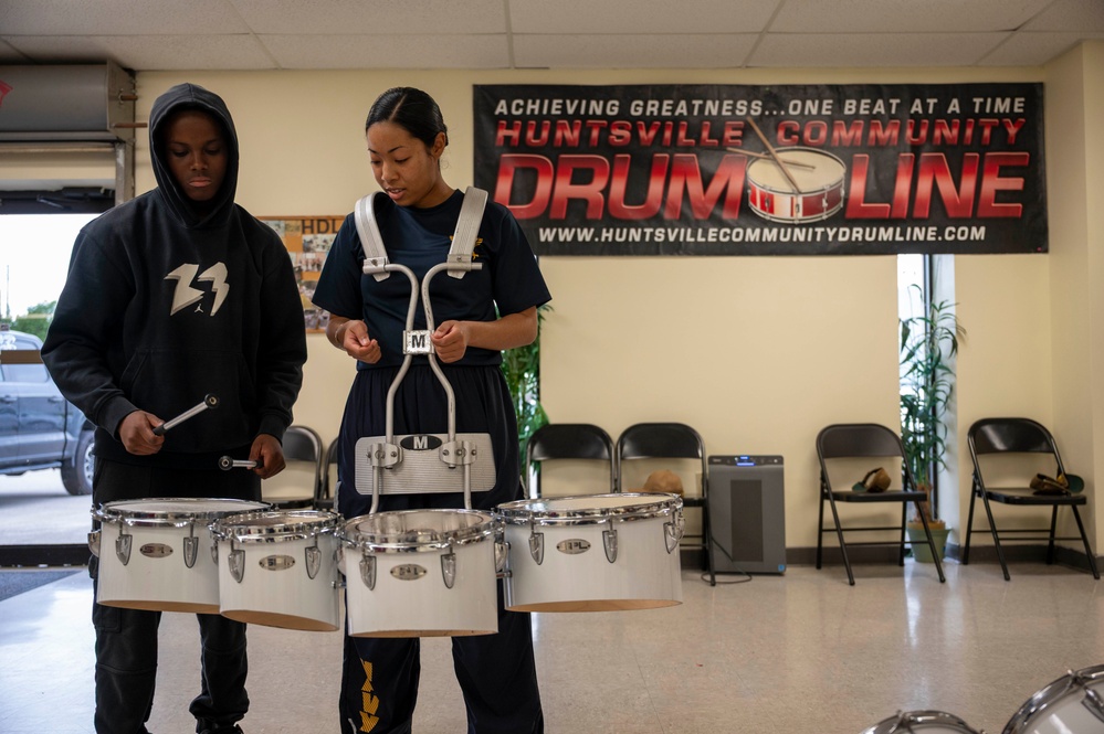Stick Masters teach Sailors to play percussion instruments