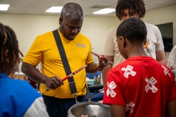 Stick Masters teach Sailors to play percussion instruments [Image 5 of 14]