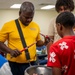 Stick Masters teach Sailors to play percussion instruments