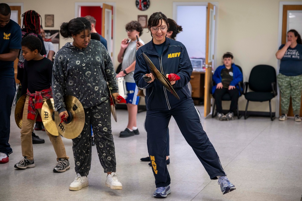 Stick Masters teach Sailors to play percussion instruments