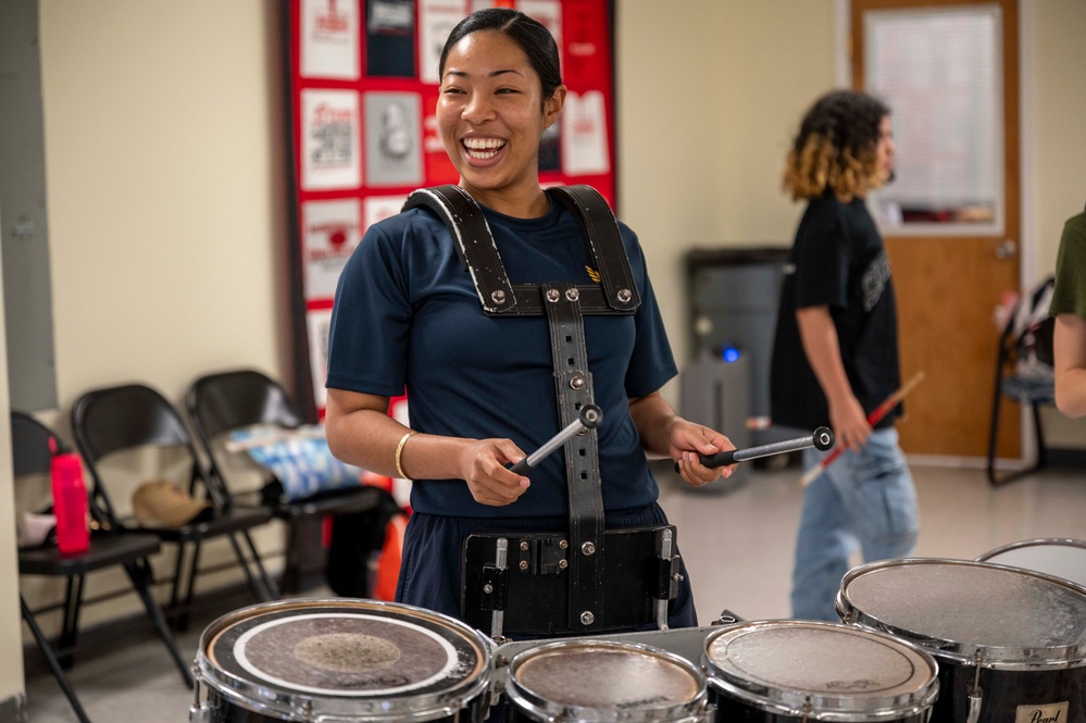 Stick Masters teach Sailors to play percussion instruments