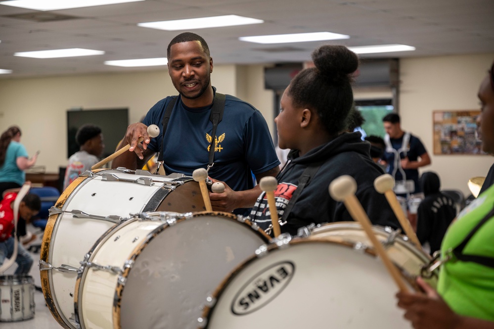 Stick Masters teach Sailors to play percussion instruments