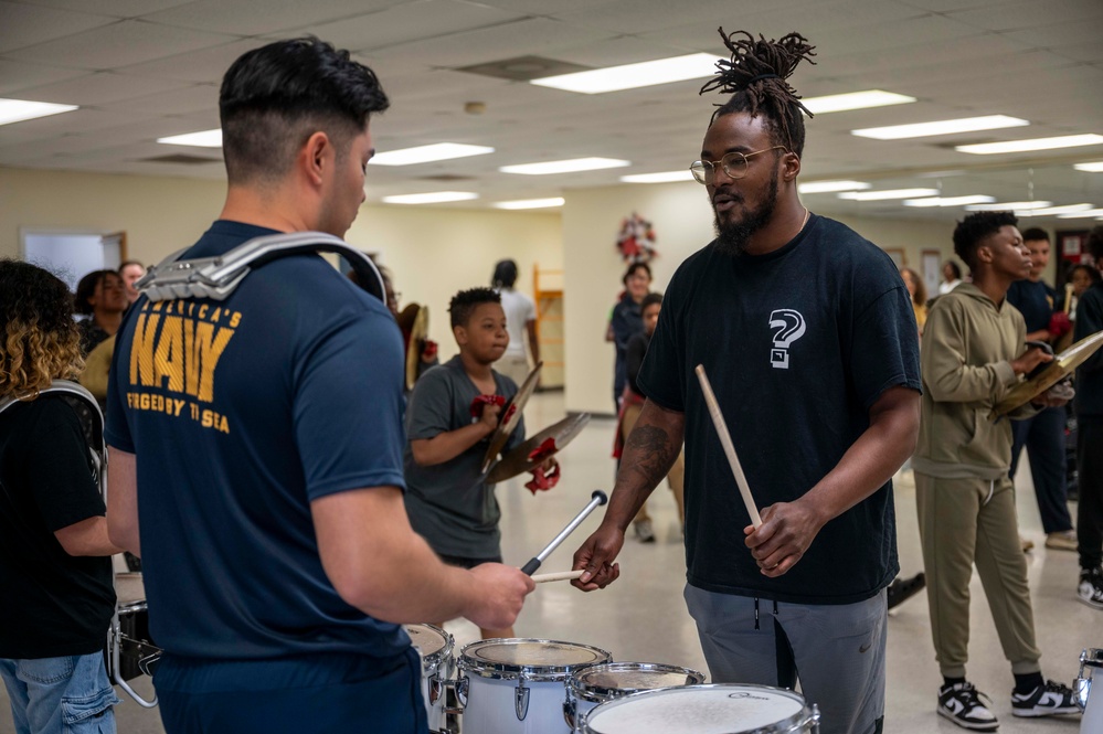 Stick Masters teach Sailors to play percussion instruments