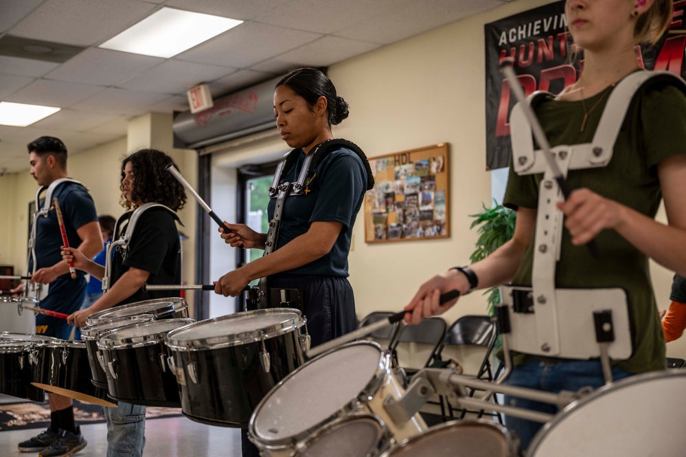 Stick Masters teach Sailors to play percussion instruments