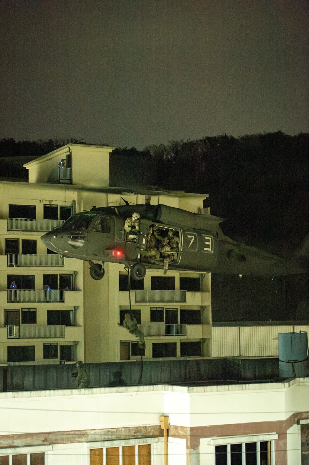 U.S. Naval Special Warfare operators team up with ROK counterparts to conduct routine nighttime training