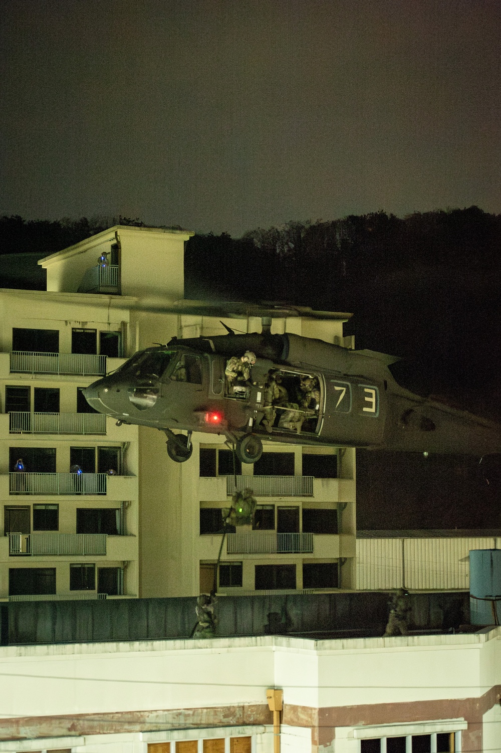 U.S. Naval Special Warfare operators team up with ROK counterparts to conduct routine nighttime training