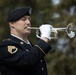 Alaska Army National Guardsman plays Taps during memorial service