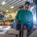 Marines Conduct Aircraft Maintenance On USS Iwo Jima