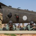 Black Hawk Coordination: U.S. Army Door Gunner Guides Syrian Partners in Joint Air Assault Training